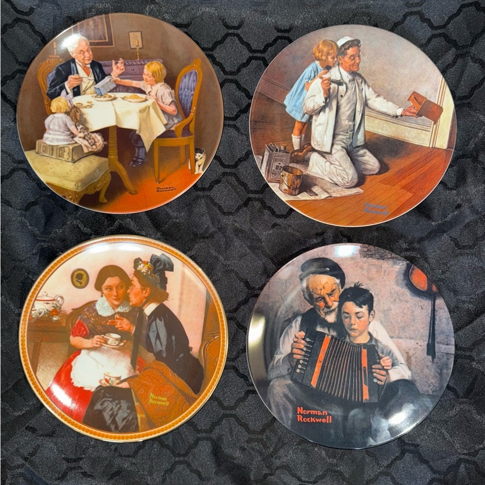 Norman Rockwell set of eight collector plates in perfect condition.